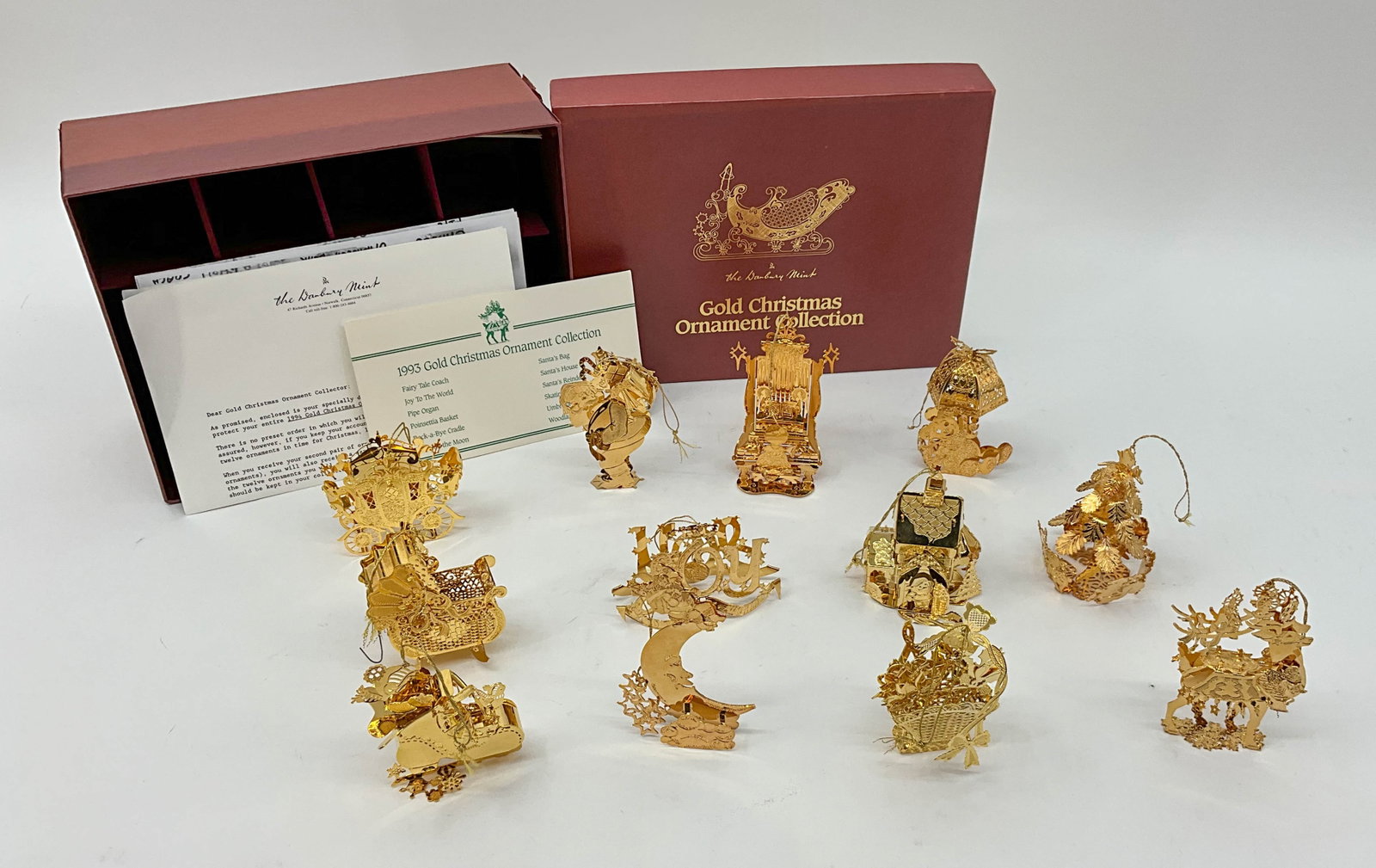 Danbury Mint Gold Ornaments, 1993: The gold ornament collection from Danbury Mint. Year 1993, 12 ornaments. 23K gold electroplate. All stamped, comes with original box. From a single owner collection, PA estate, stored in a box.Box Siz