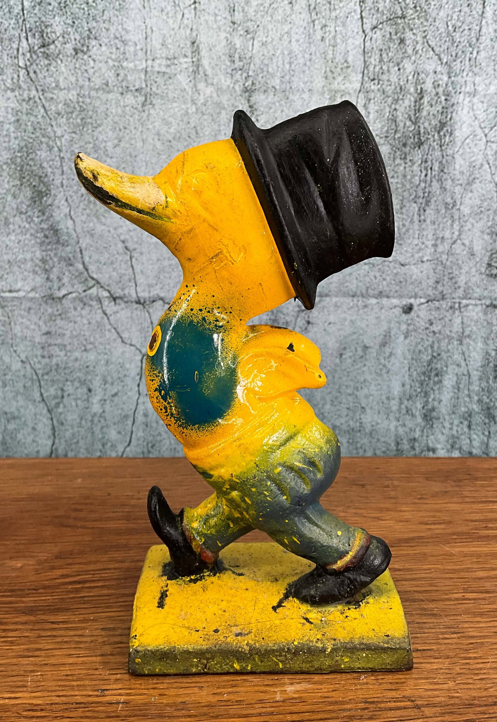 Top Hat Duck -Astride, Door Stop, Cast Iron: Top Hat Duck -Astride, Door Stop, Cast Iron. Height: 8" Provenance: Single owner collection, suburban Philadelphia estate. Shipping Note: For your convenience, we have arranged with Craig Vogin at The