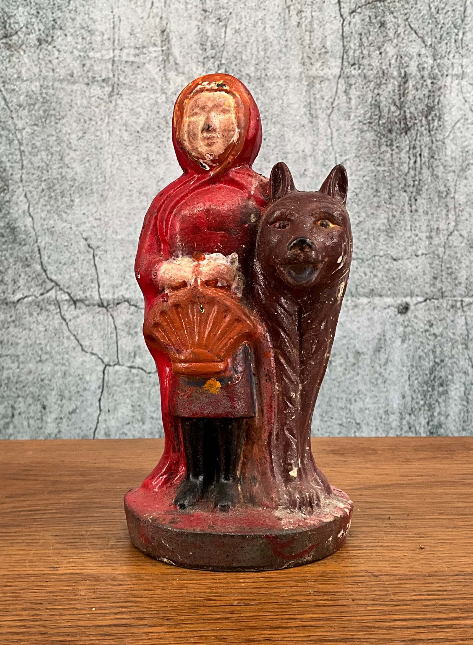 Little Red Riding Hood with Wolf Still Bank: Little Red Riding Hood with Wolf Still Bank. Height: 6.5" Provenance: Single owner collection, suburban Philadelphia estate Shipping Note: For your convenience, we have arranged with Craig Vogin at Th