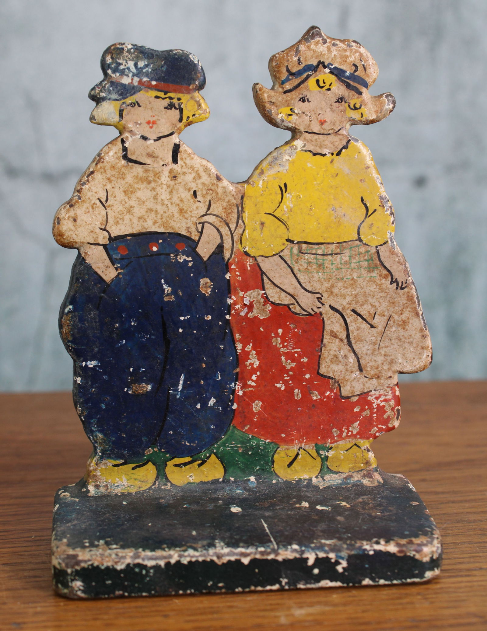 Dutch Boy and Girl Doorstop: Dutch Boy and Girl Doorstop, Bookend. Cast iron. Height: 5.5" Provenance: Single owner collection, suburban Philadelphia estate. Shipping Note: For your convenience, we have arranged with Craig Vogin