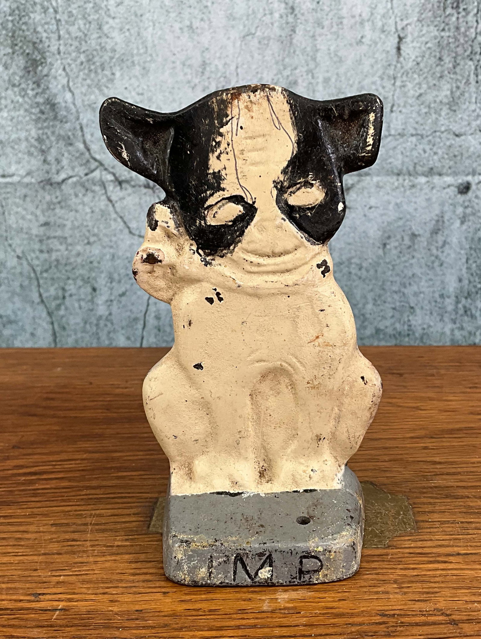 Hubley Imp Cast Iron Doorstop: Adorable Imp the Boston Terrier door stop, by Hubley, design #142, over painted but matches original color way, small hole on front, missing removable dog bone, single piece cast. Provenance: Single o