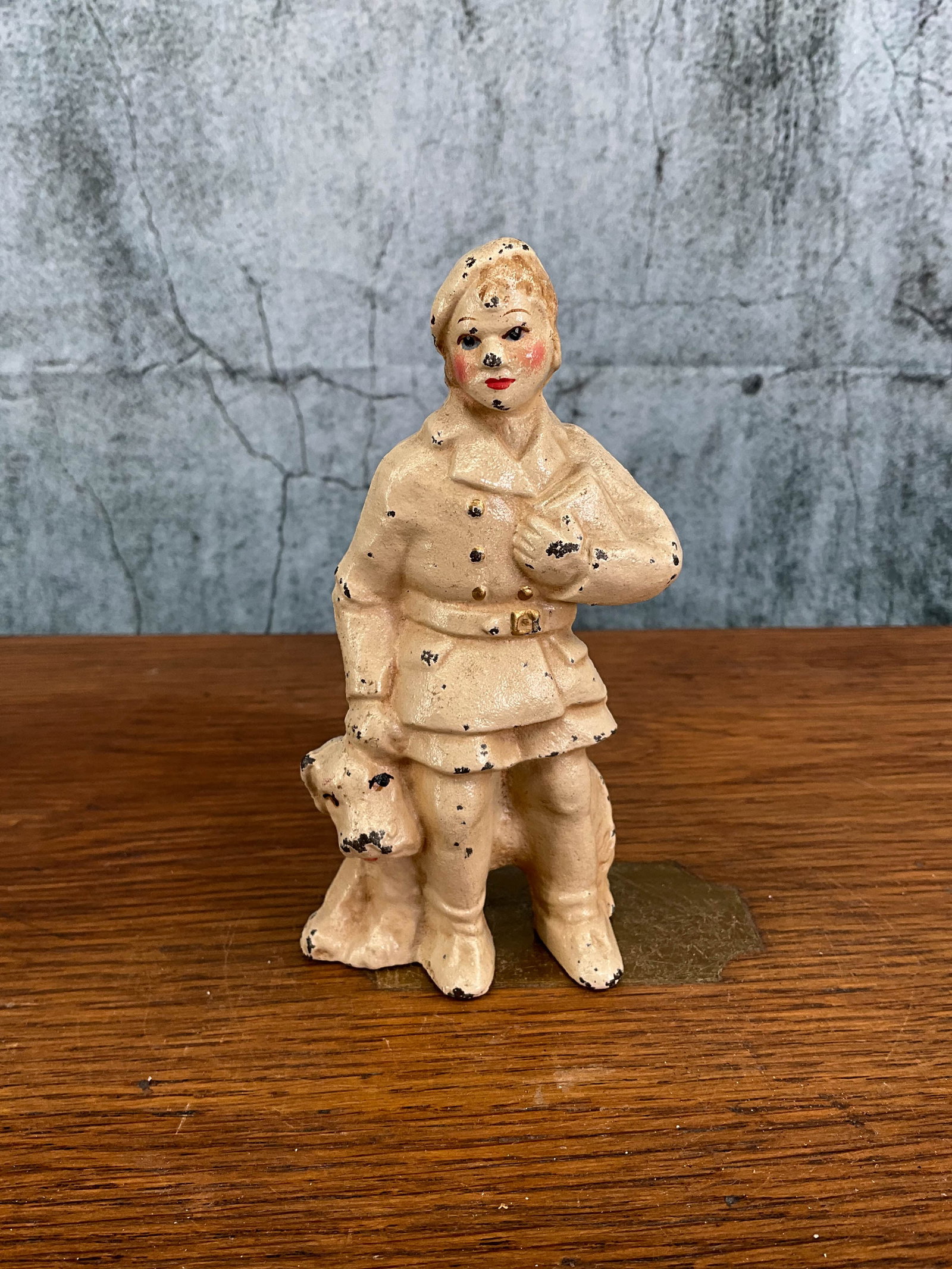Cast Iron Girl with Dog Door stop: Cast iron Young Lady with dog, cast iron with seem, full round figure. Provenance: Single owner collection, suburban Philadelphia estate. Size: 5"T Shipping Note: For your convenience, we have arrange