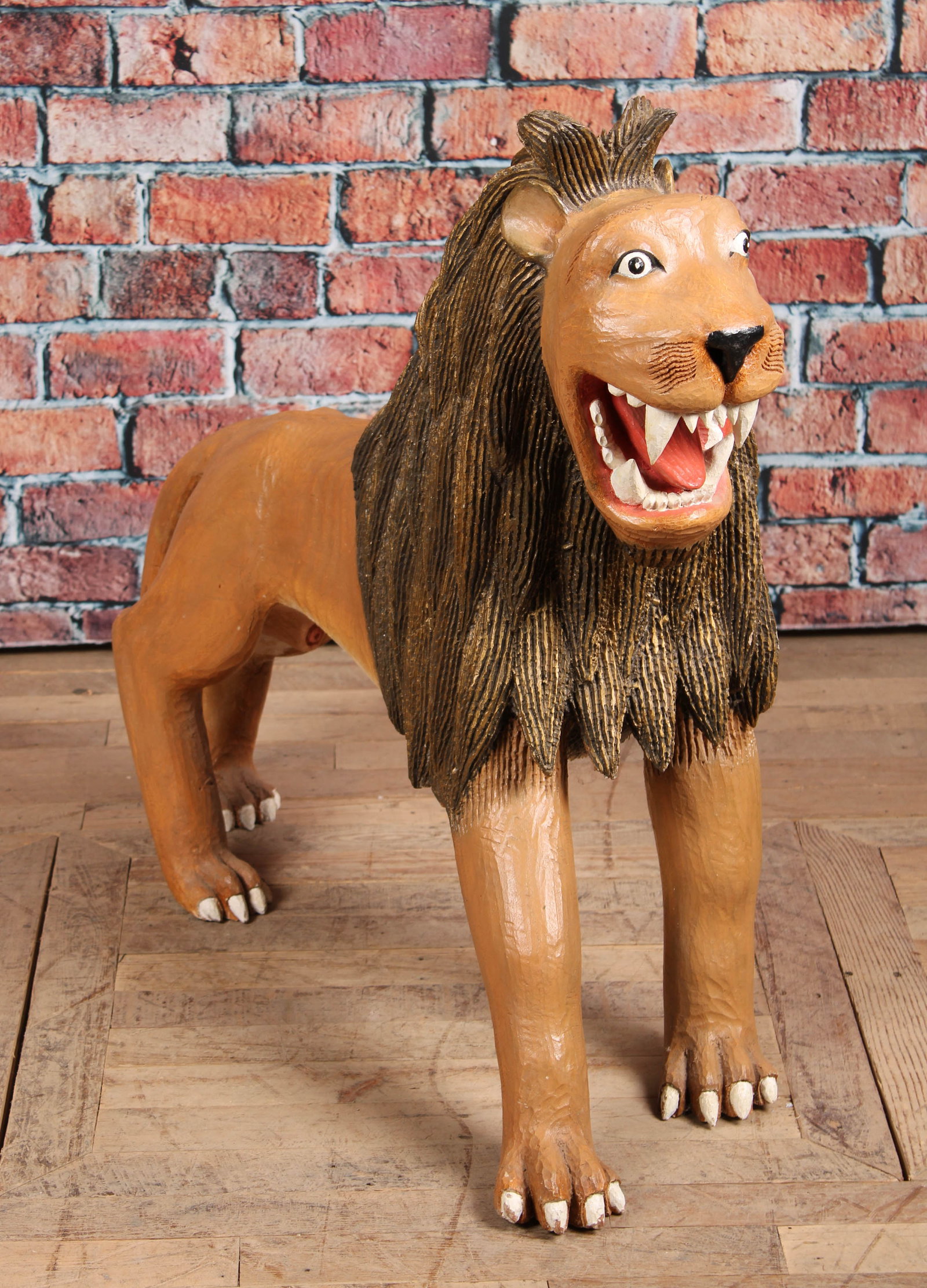 Folk Art Carved Wood Lion Sculpture: Folk Art Carved Wood Lion Sculpture Size: H 35" x W 15" x D 42"
