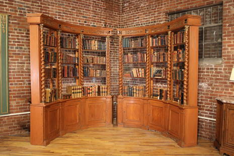 Pair Antique Painted Concave Bookcases: A great pair of Continental 19th Century carved and painted curved bookcases possibly from an apothecary each one with a open work cornice over shelves framed by barley twist columns. Books not 