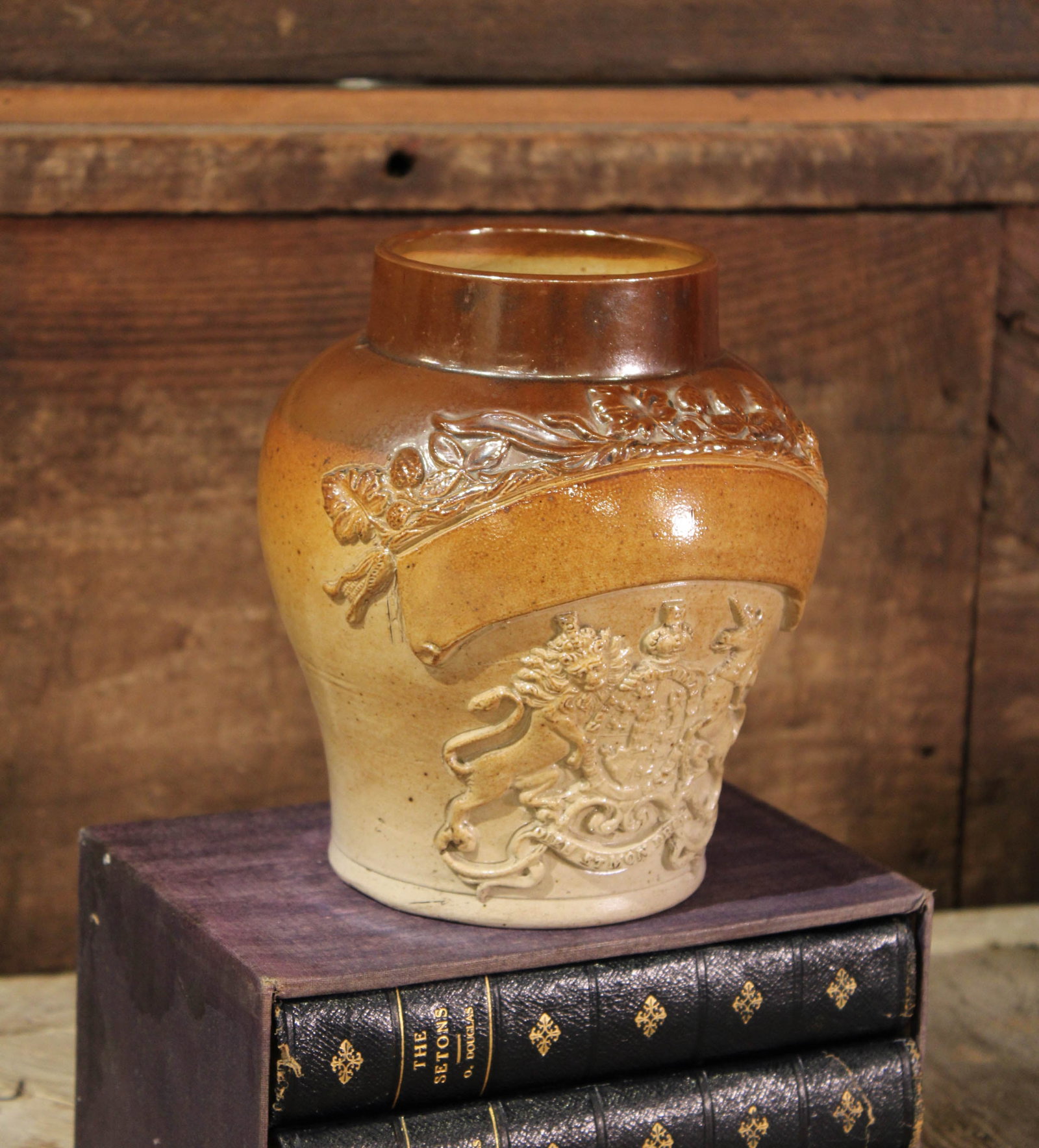 English Chesterfield Salt Glazed Jar: English Chesterfield salt glazed jar with heraldic imagery. Size: 6.5"T x 6" diameter Circa: 1800. List Price: $1560