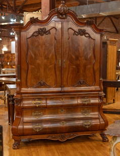 Dutch Walnut Armoire, Central Urn Finial: Dutch walnut armoire with shaped cornice over 2 doors on a Bombay base with paw feet. Beautiful central urn finial. Size: 102"T x 72"W x 28"D Circa: 1860 List Price: $39000