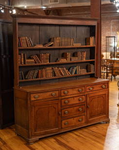 Antique Walnut Welsh Dresser, Cupboard: 18th Century English oak Welsh type dresser with banded drawers and doors raised on bracket feet. Size: 83.5"H x 73"W x 21"D Circa: 1760 List Price: $26880 Books not included.