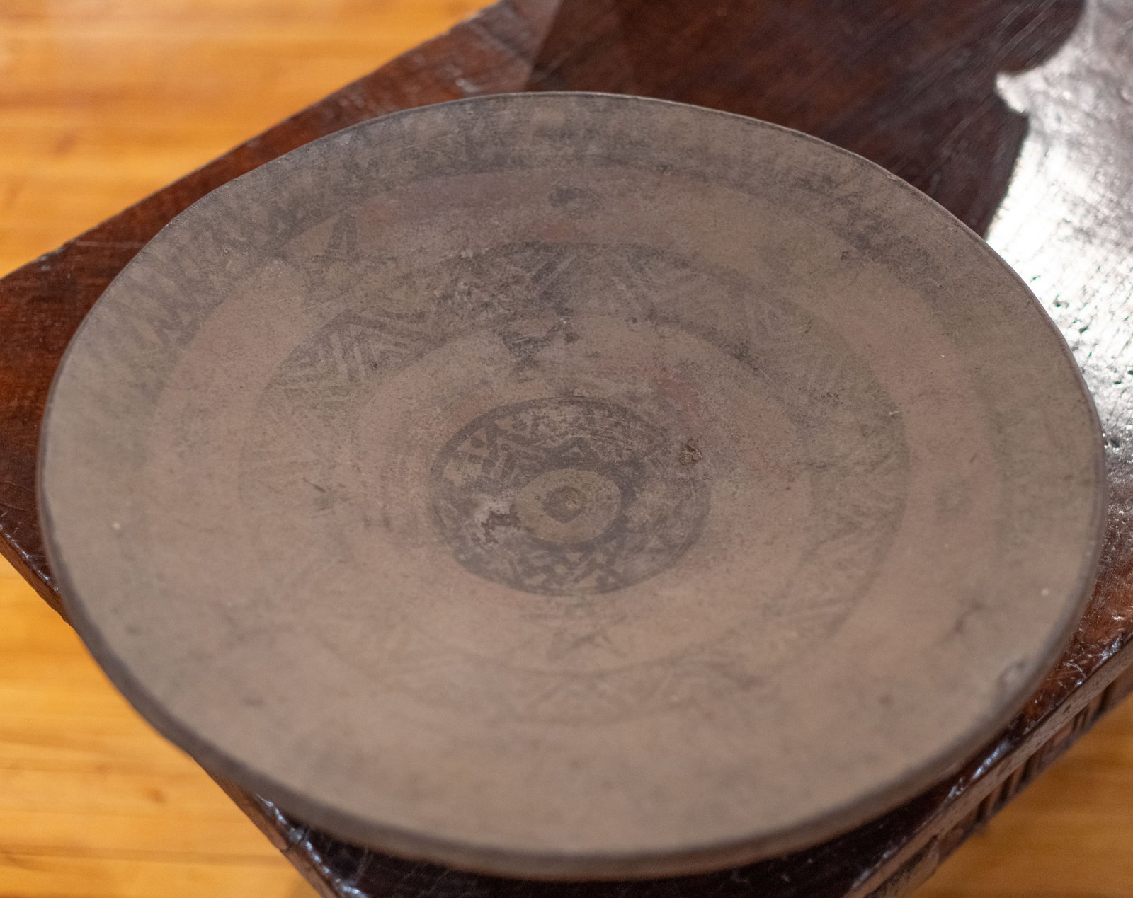 Antique Moroccan Terracotta Flat Bread Bowl: Dark terra cotta bread bowl from Morocco, geometric circular pattern. Size: 6"T x 24" diameter Circa: 1840 List Price: $1450