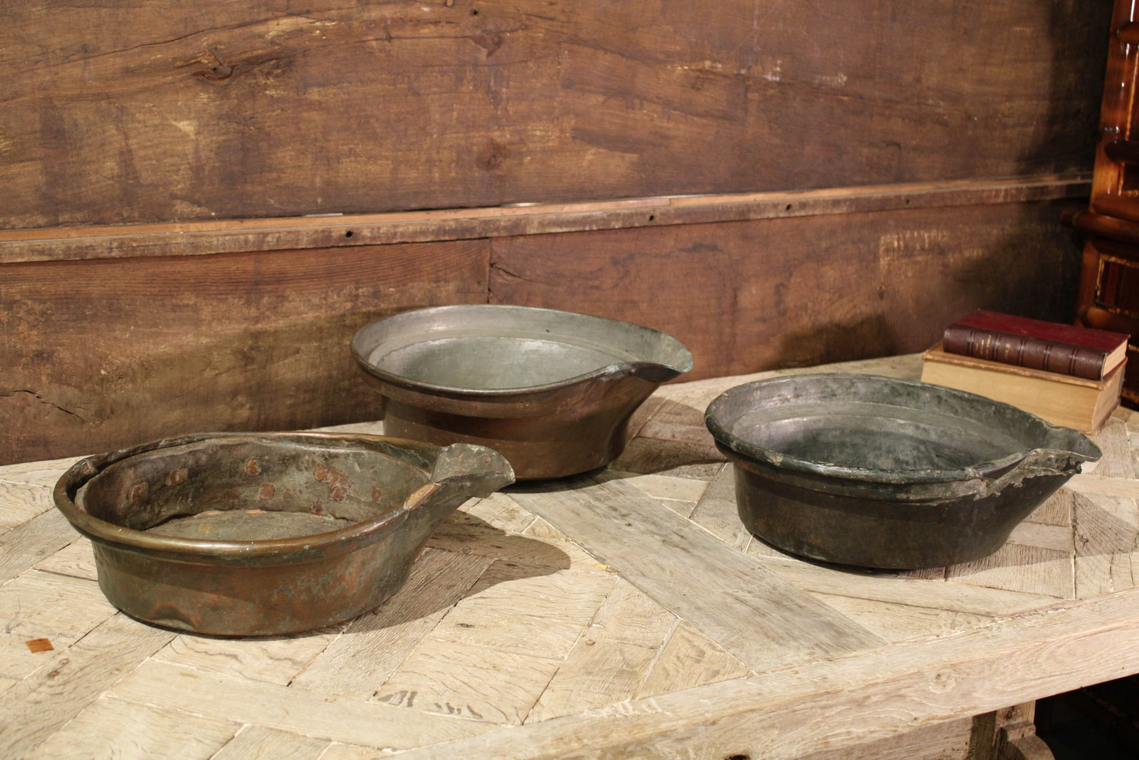 Three French Copper Wine Overflows: Rustic patinated copper wine overflows from France. Size: 7"T x 15" diameter approximately for each Circa: 1820 List Price: $960each