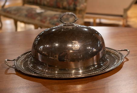 English Silver Tray And Cloche: English silver plate serving tray with dome, mismatched set. Size: tray 28" x18" , cloche 11"T x18"L Circa: List Price: $2500