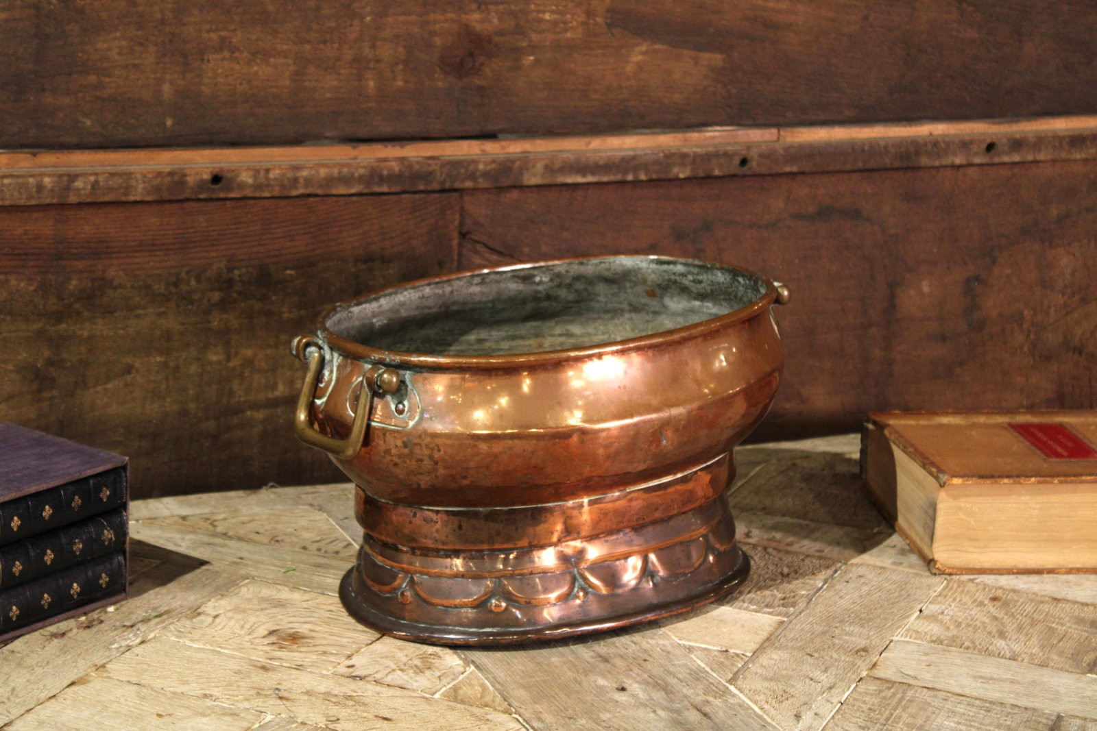 Antique Copper Vat, Wine Cooler: Oblong copper wine chiller with brass handles and scallop detail. Size: 9"T x 11"W x 6"D Circa: 1780 List Price: $2200 Books not included.