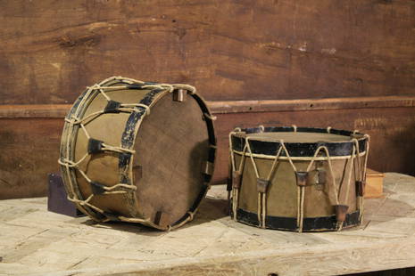 Pair French Painted Drums: Decorative wooden drum sculptures, with rope detail. Size: 10"T x 16" diameter Circa: 1850 List Price: $1725 Books not included.