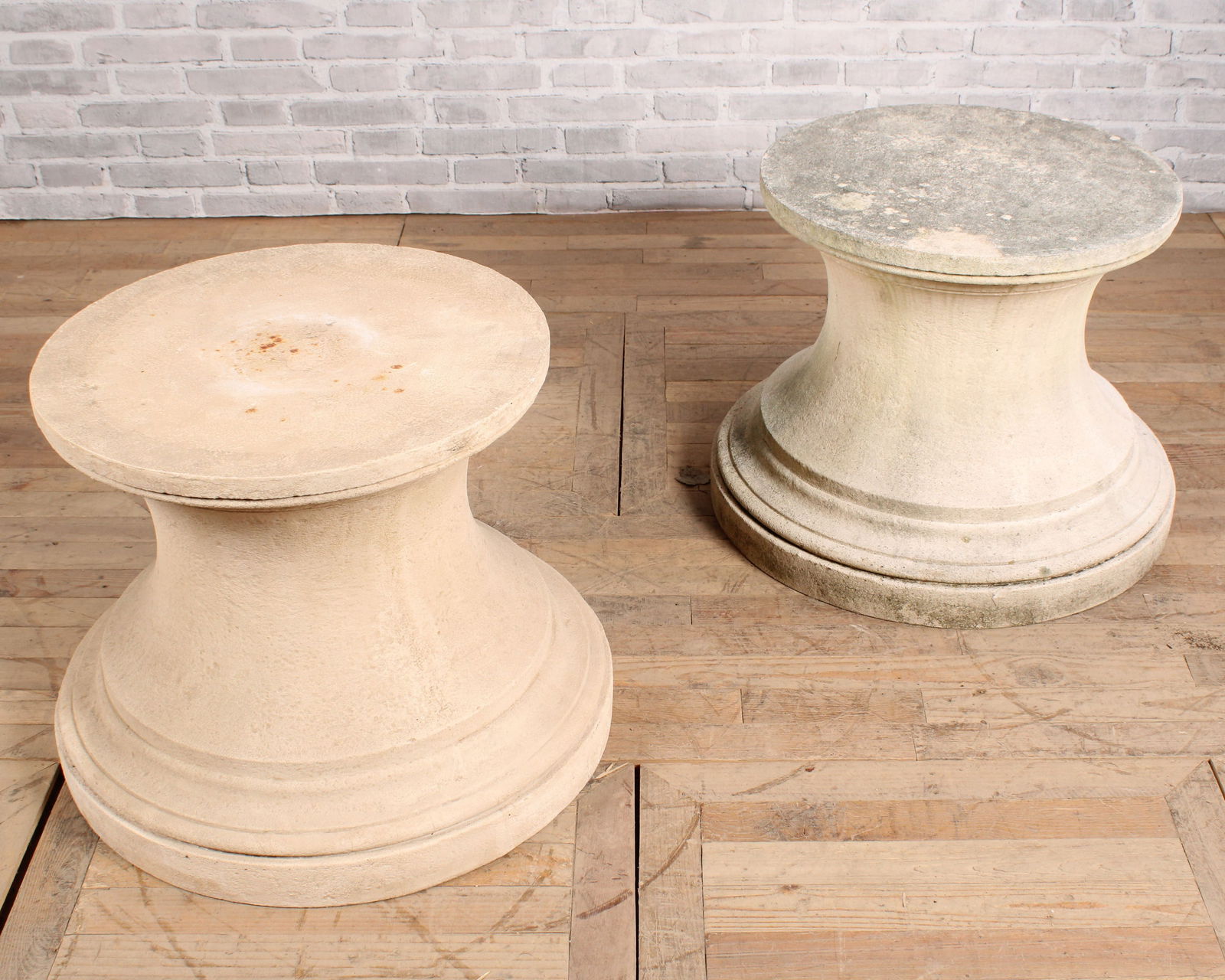 2 Composite Stone Side Tables, Michael Taylor: Pair of composite stone side tables. From a private Princeton estate. Size: 22.5"T x 30" diameter, both
