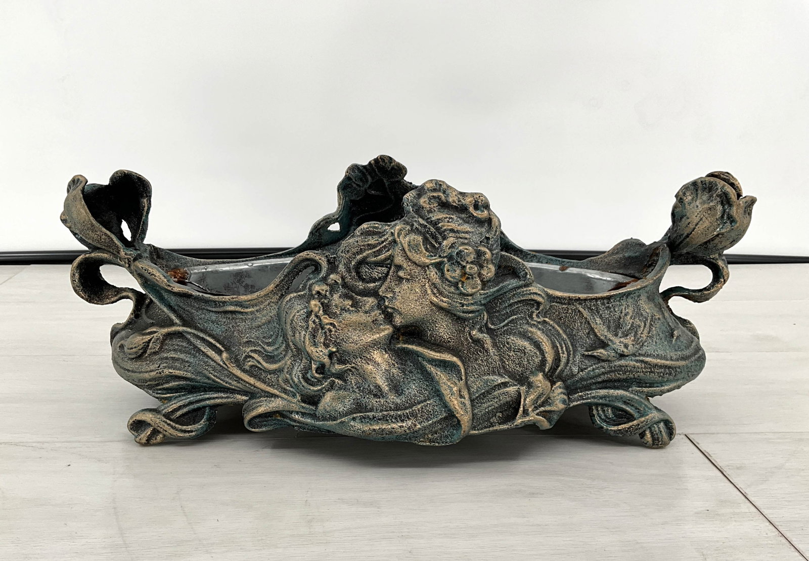 Art Nouveau Cast Iron Jardiniere: Art Nouveau cast iron jardiniere with insert. Size: 7"H x 18"W x 8"D