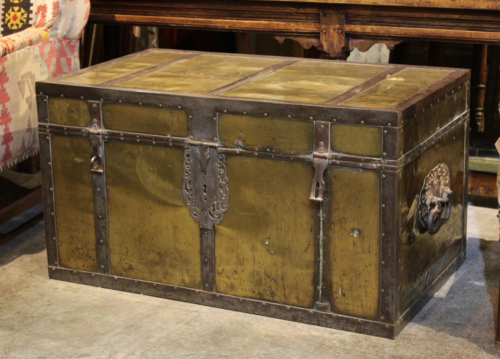 Sino Portuguese Camphor Lined Coffer: A 19th Century Sino Portuguese Camphor wood campaign chest having steel trimmed brass exterior with elegant pierce decorated escutcheon and handles. Size: 23"H x42"W x24.5"D Circa: 1860 List Price: $1