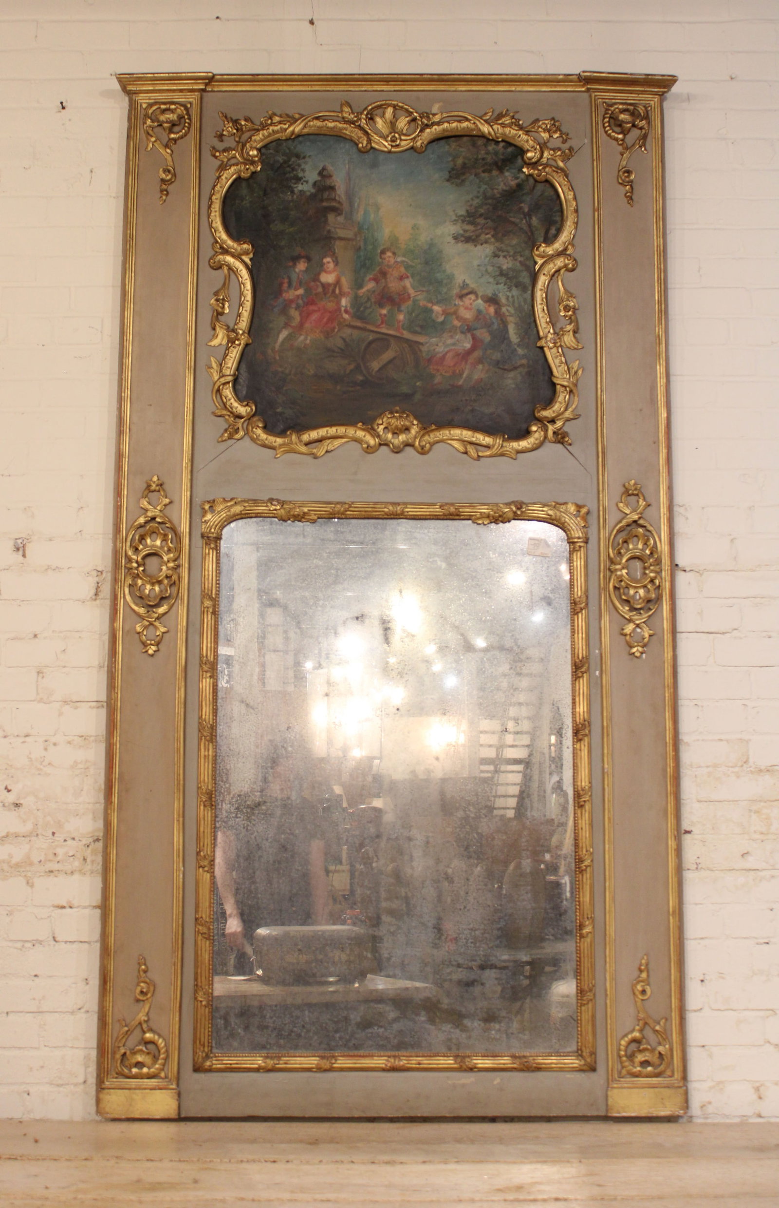 French Trumeau Mirror, Genre Scene Painting: French Trumeau Mirror, gilded with fun genre scene painting. Size: 86"T x 47"W Circa: 1870 List Price: $7200