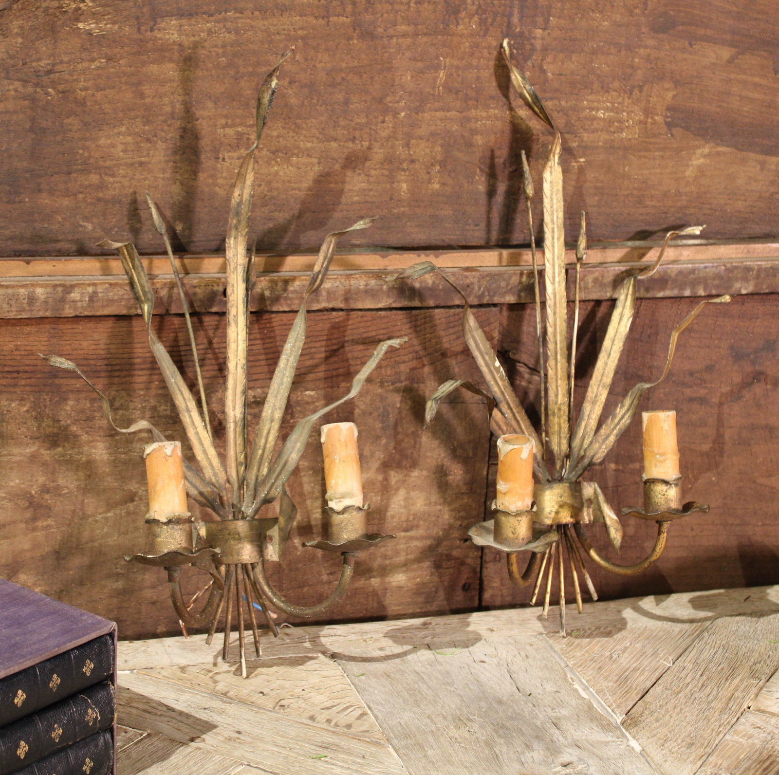 French Gilt Metal Sconces: Gilt metal floral sconces, candle ready or would need to be rewired. Size: 18"T x 12"L x 4"D Circa: 1920 List Price: $960