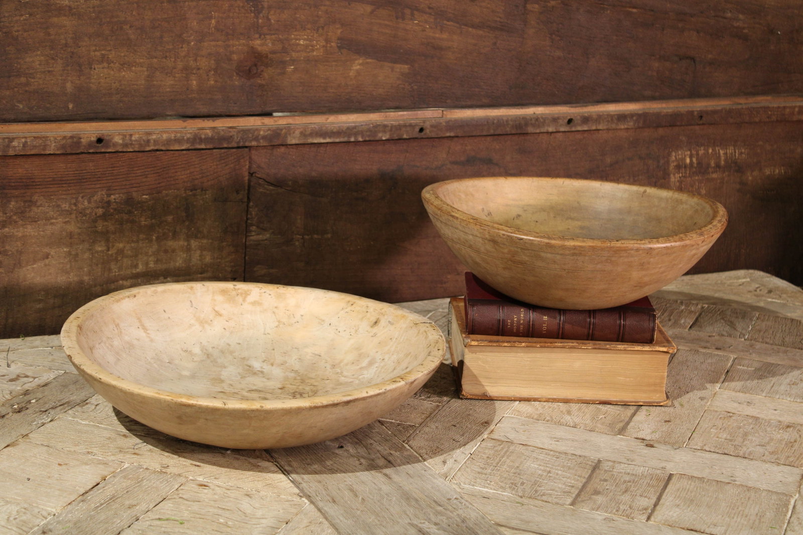 Group of 2 Antique English Sycamore Bowls: Pair of antique light wood bowls. Size: 5.5"T x 16" diameter & 4"T x 18" diameter Circa: 1800 List Price: $4000 Books not included.