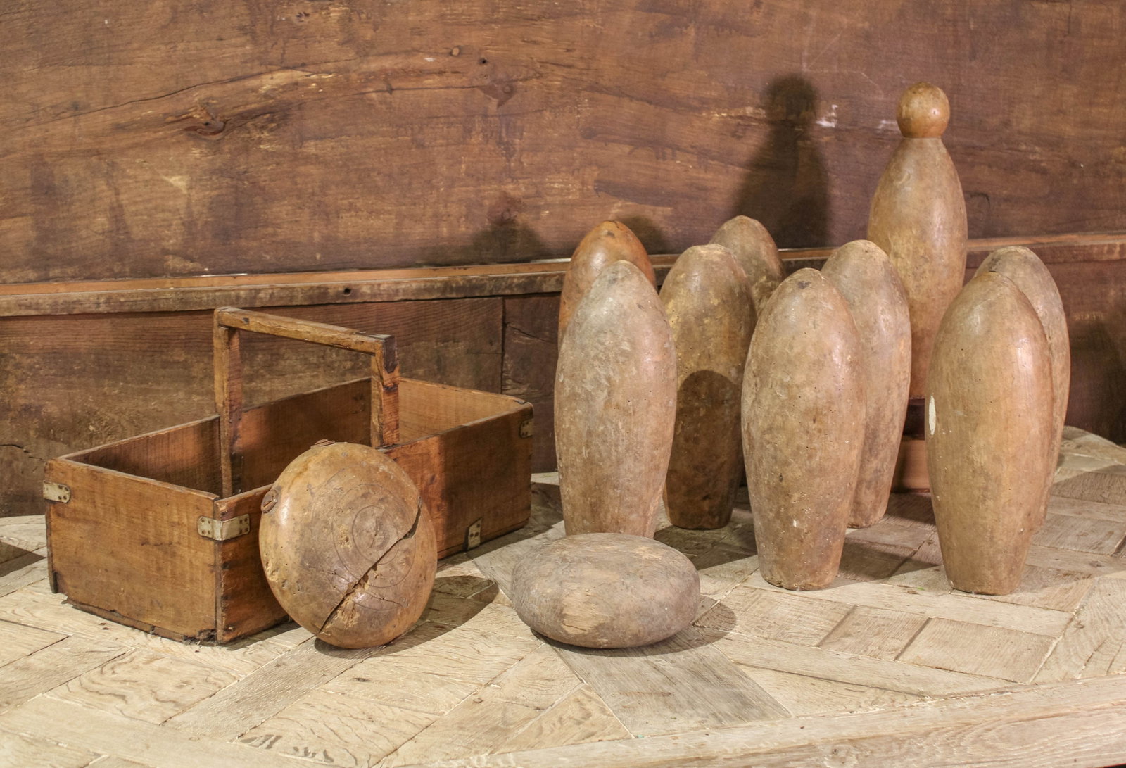 English Fruitwood Skittles In French Trug: Group of antique skittles in a trug. Size: 14"T Circa: 1850 List Price: $2700 Books not included.