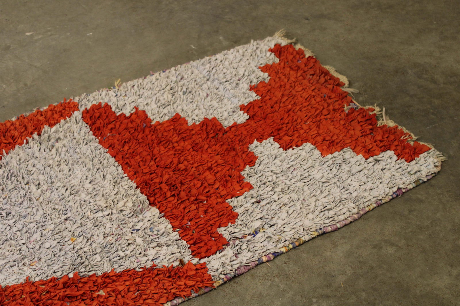 Hand Knotted Fabric Rag Rug: Hand knotted fabric rug, runner, American made. Size: 122" x 34" Circa: 1910 List Price: $3900