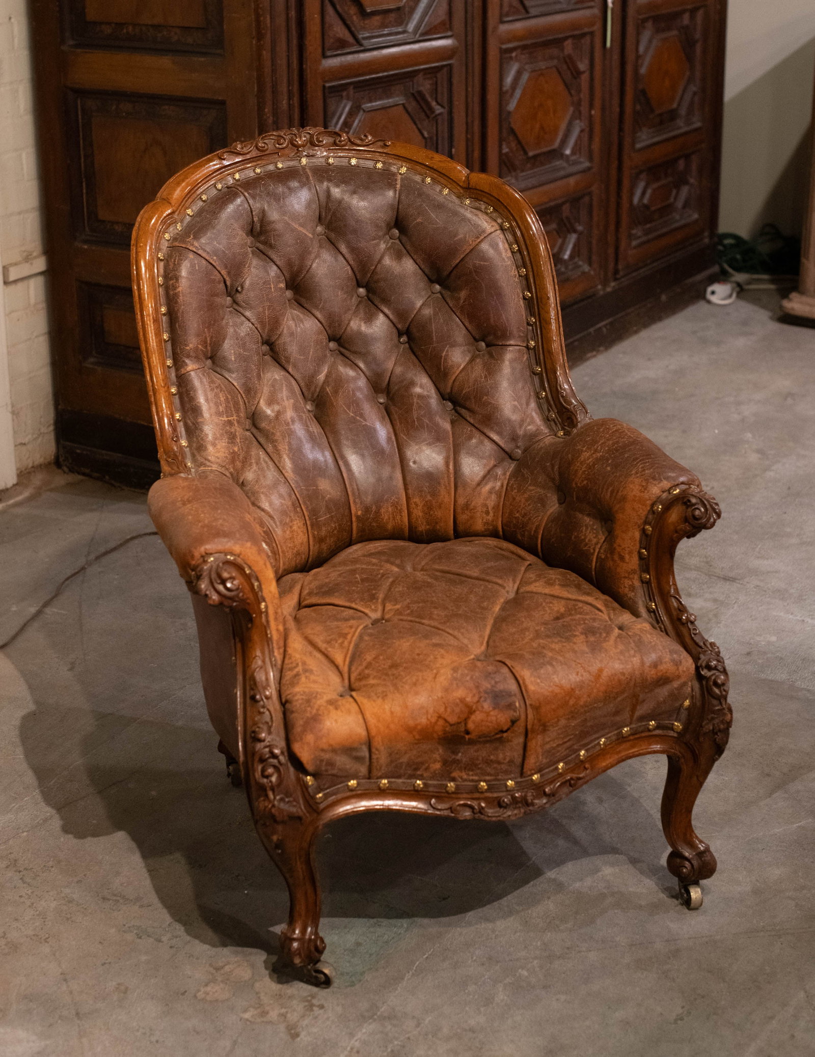 English Country House Library Chair, Leather: 19th Century English country house leather library chair having button tufted back and seat. Size: 37.5"H x28x"W 24'D seat height 16" Circa: 1860 List Price: $3900