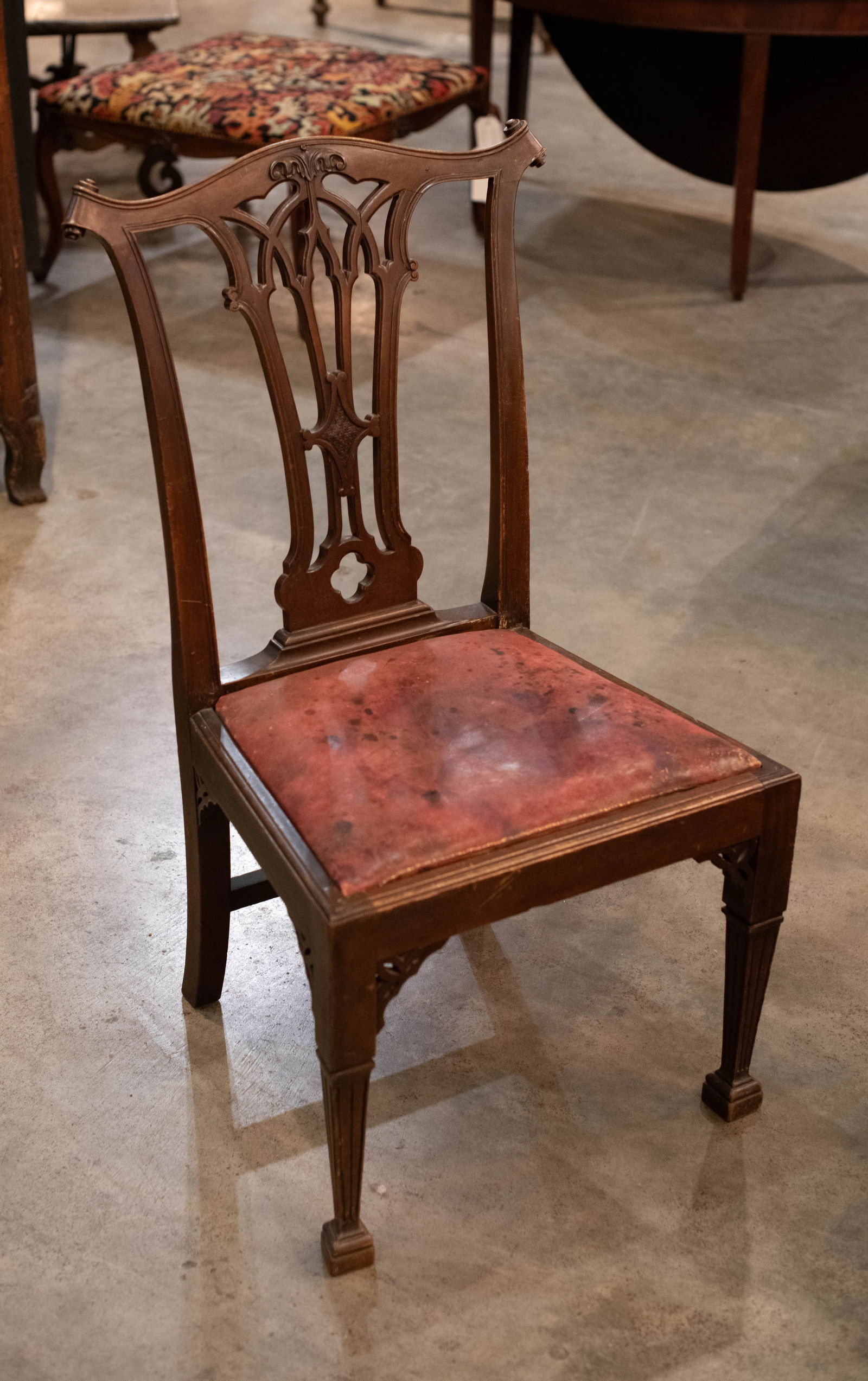 Chippendale Mahogany Side Chair: Chippendale Mahogany Side Chair, leather upholstery, fluted tapered legs with carved corner details. Size: 38" H x 22" W x 20 D, seat height 17" Circa: 1860 List Price: $1350