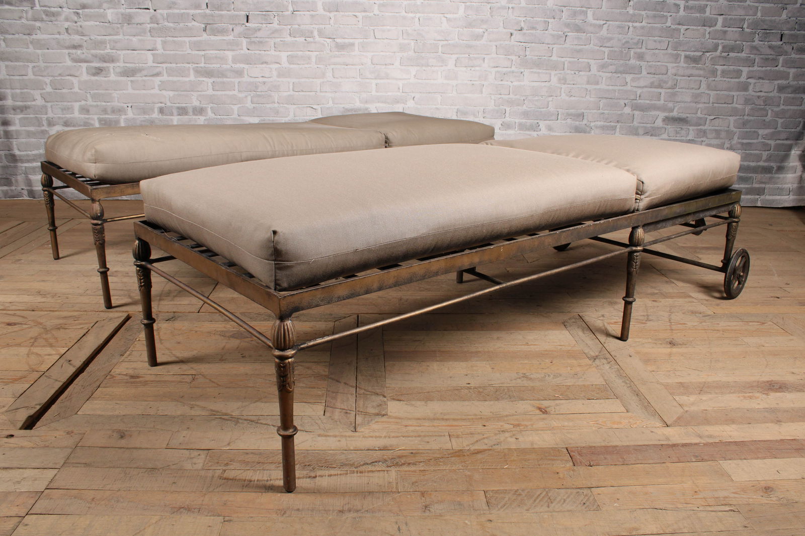 Pair Chaises Longue, Michael Taylor, Montecito: Pair of wheeled chaise lounges, Michael Taylor Montecito collection, with cushions. From a private Princeton Estate. One is missing a support beam, one is missing a ratchet bracket. Sold as is. Size: