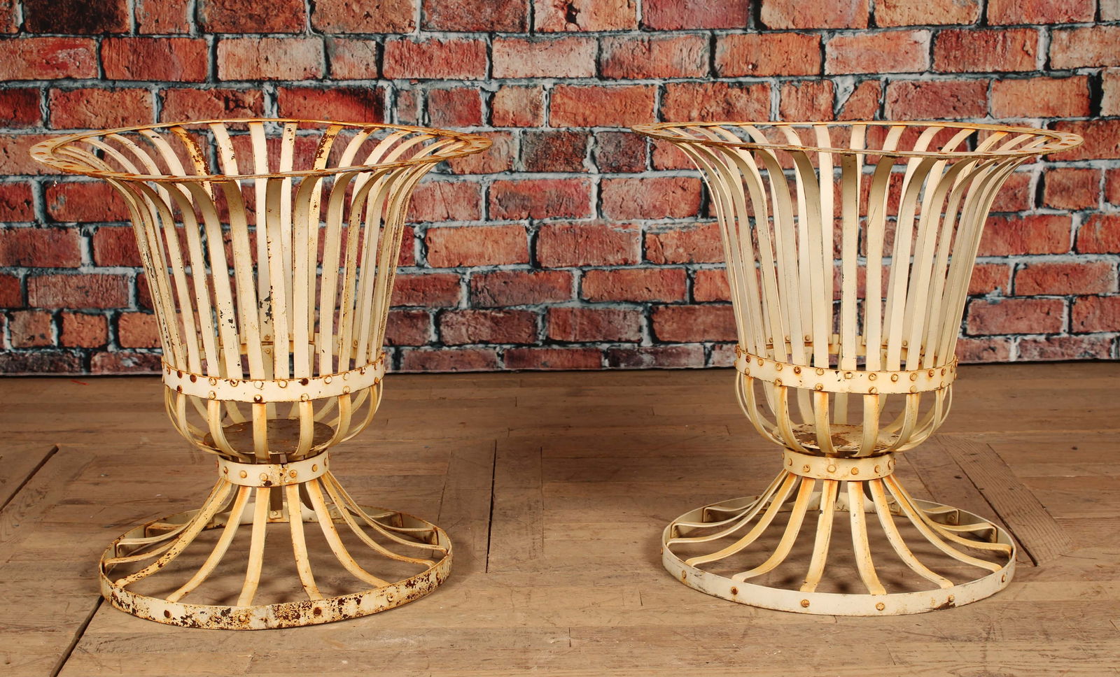 Pair Wrought Iron Strapwork Basket Urns: Wrought iron basket urns, classical form with patina throughout. Size: 23.5"H x 23.5"Dia.