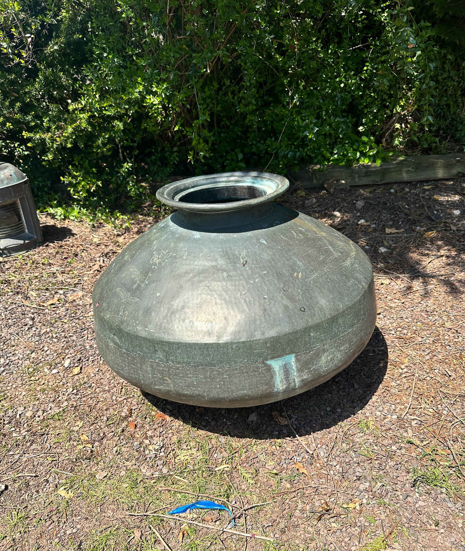Oversized Bronze Vessel, Incised Decoration: Large scale bronze vessel with small floral design. Size: 23"T x 30" diameter