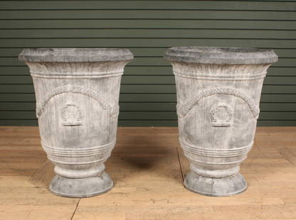 2 French Anduze Style Cast Iron Garden Planters: Pair of French Anduze style planters, cast iron with garland and banding details. Size: 27.5"H x 22"Dia.