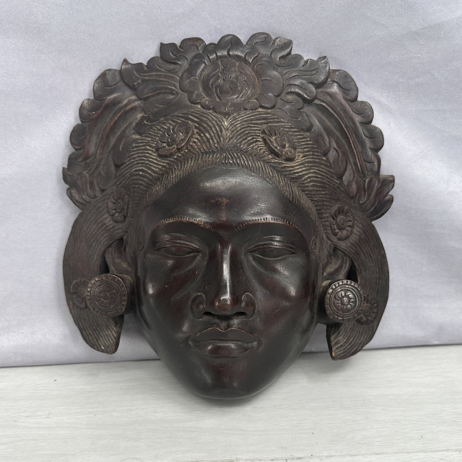 Female Carved Wood Mask: Female form carved wood mask, Southeast Asian, stunning head dress. Size: 12"T x 11.5"L x 4"D