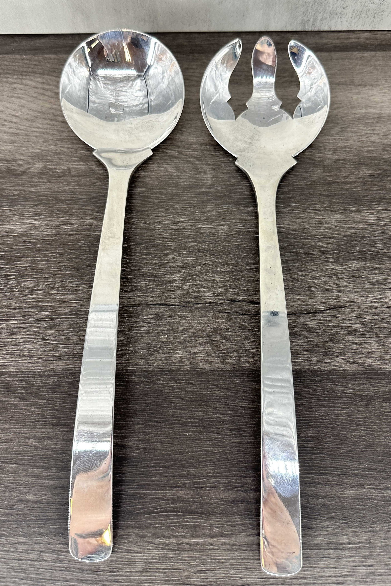 Large Salad Service, Made For Steuben: Sterling silver salad service made by Graff, Washbourne, & Dunn for Steuben. First half of the 20th C. Size: 11.5"L, 265.7g