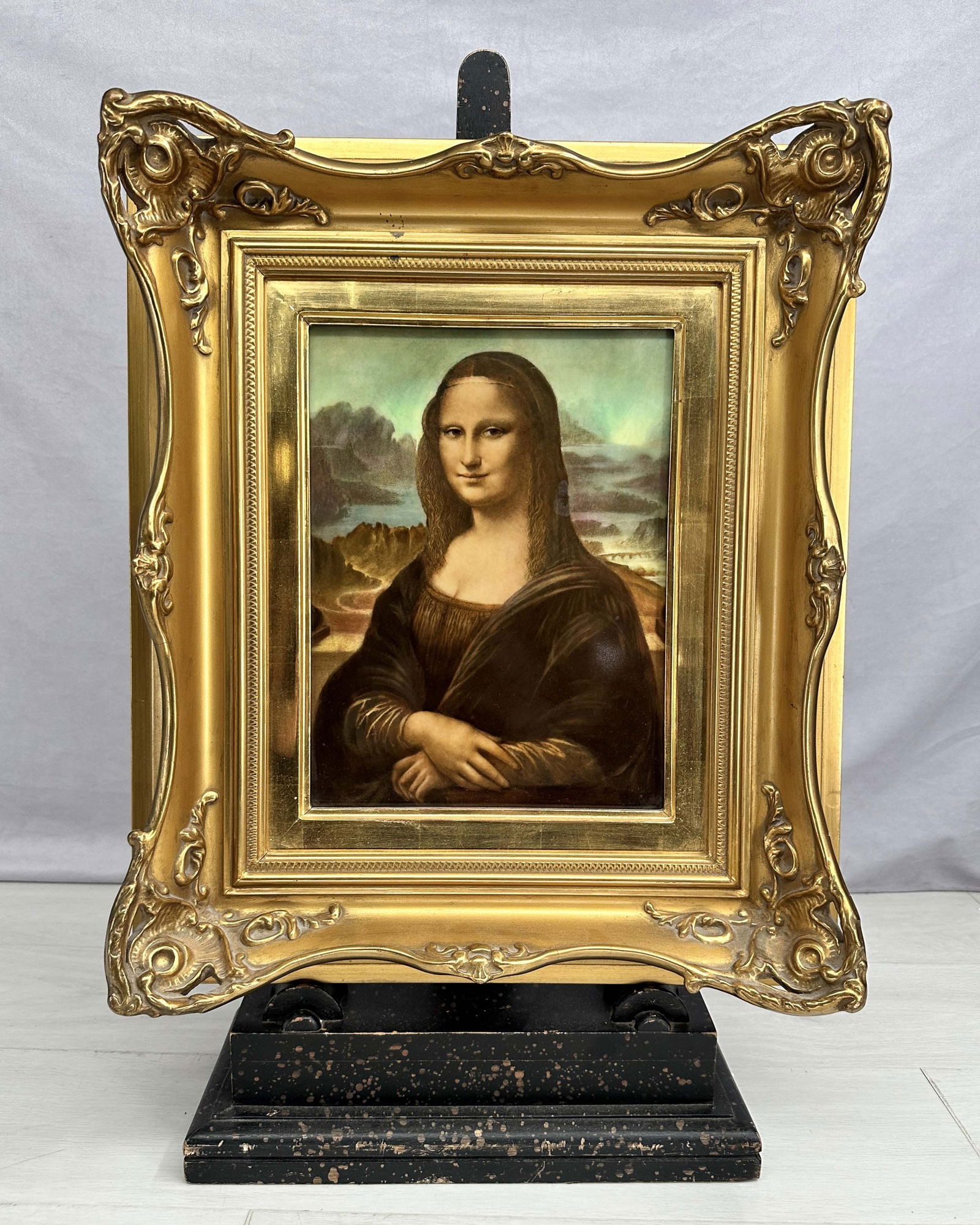 Rosenthal Mona Lisa On Porcelain: Mona Lisa painted on porcelain, from Rosenthal, German, 20th C, gilt frame. Size: 20"T x 17"W, 4" frame