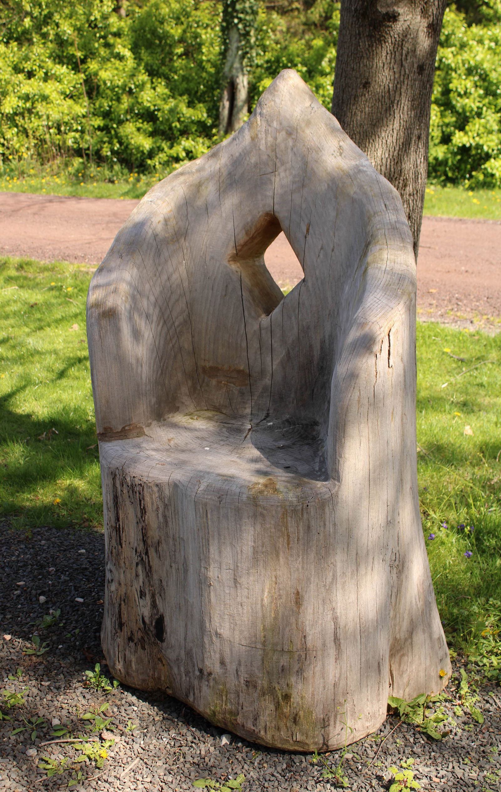 Carved Timber Chair, Outdoor Throne: Impressive scale on this chair carved from a single piece of wood. A real garden throne. Size: 58"T x 30"L x 35"D
