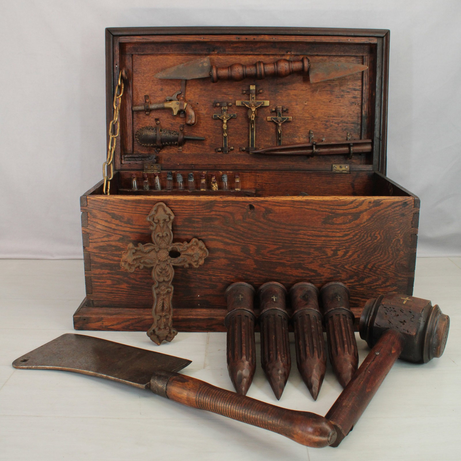 Hamlet Size Vampire Kit, Protection From Evil: Fully stocked Vampire Killing Kit, antique trunk filled with multiple styles of blades, a hammer, multiple stakes, various crucifixes, hand gun with powder flask, and an assortment of dried herbs. The