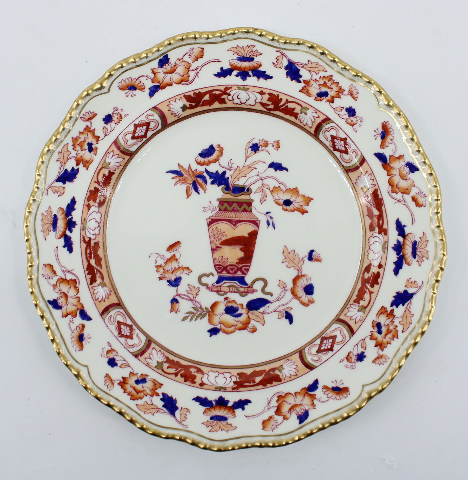 A very good set of 12 marked Royal Doulton English  plates with shaped and silt edge framing an (1 of 5)