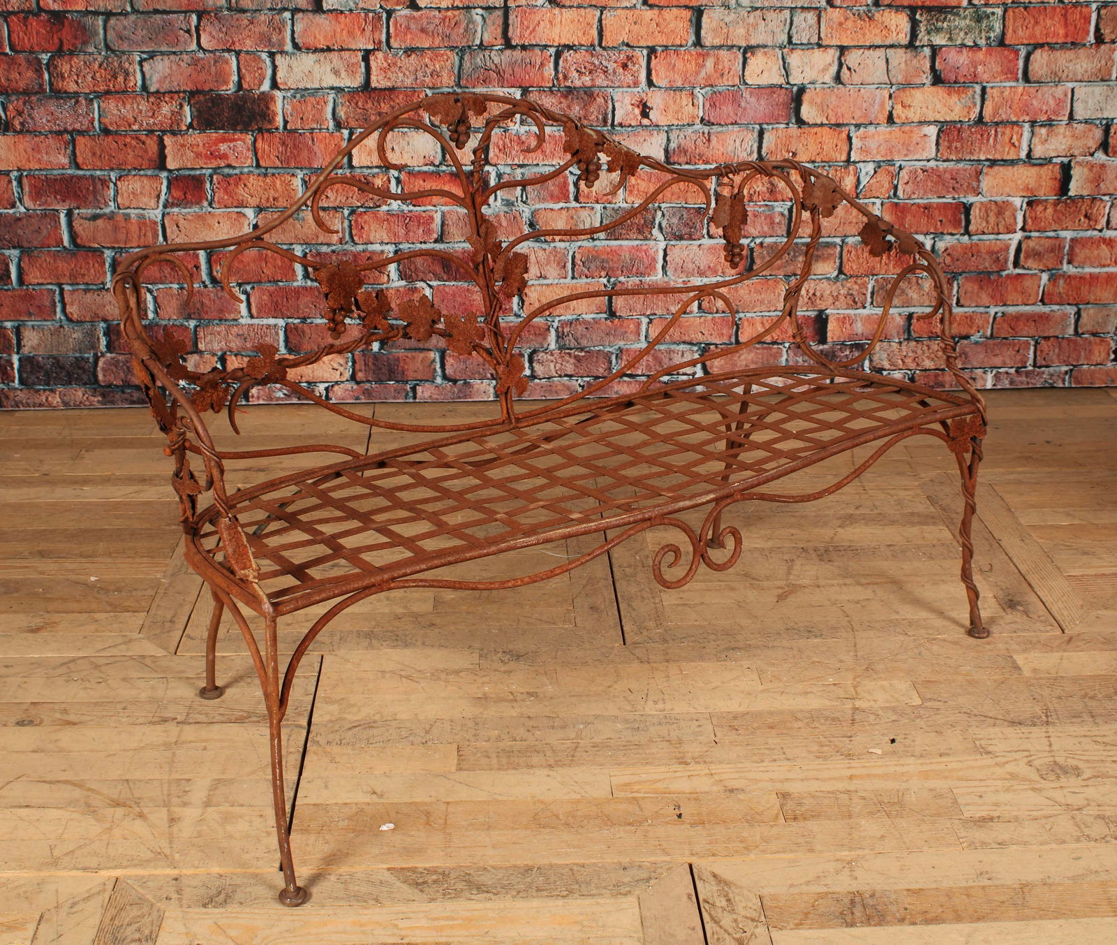 Wrought iron open work garden bench with grapevine  motif and patina finish. Size: 35.5"H x 52"W x (1 of 10)