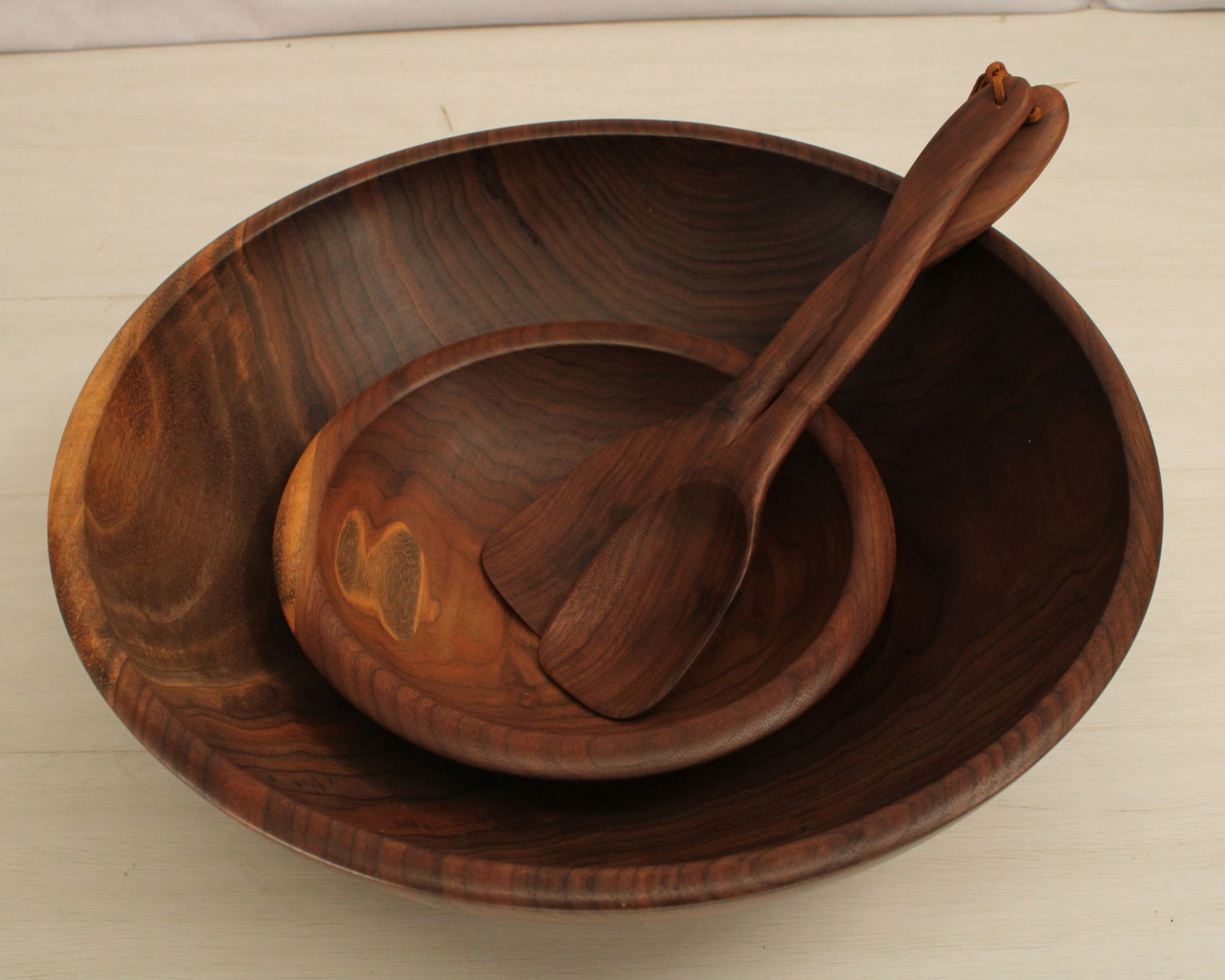 Collection of three pieces from Simon Pearce,  large bowl, small bowl, and salad servers. All  wood. (1 of 10)