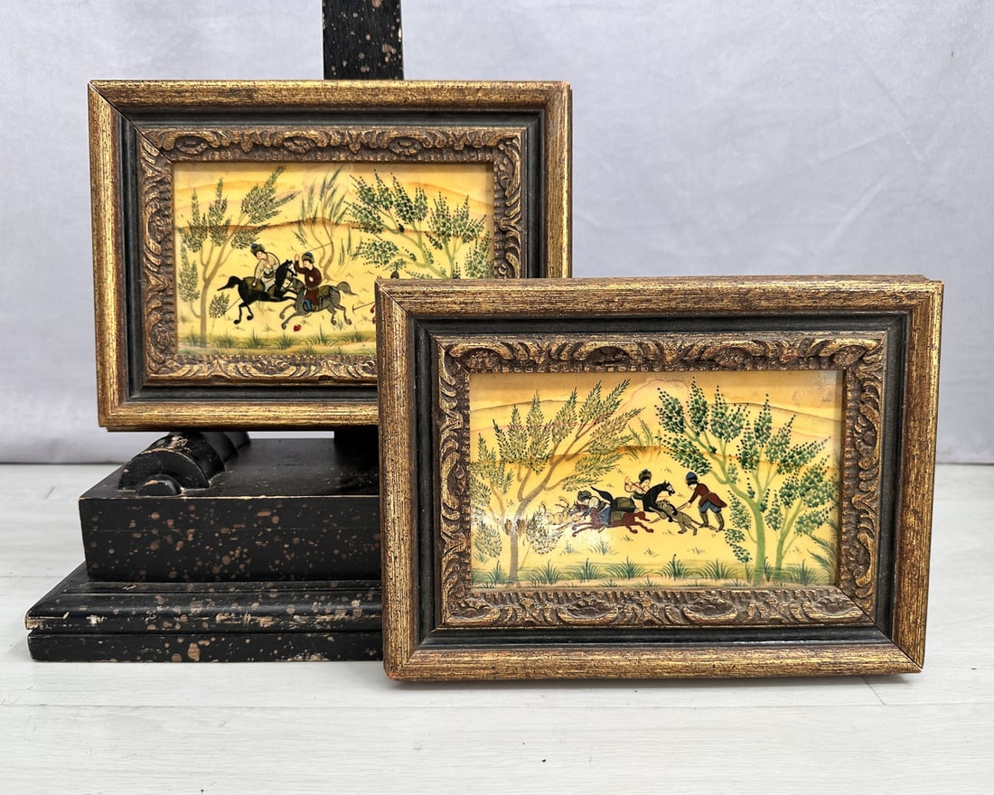 Pair Of Mughal Hunting Scene Paintings: Pair of Mogul, Mughal, or Persian hunting scene paintings, likely on bone. Carved wood frames. No signature. Size: 8"T x 10.5"L, 2" frame