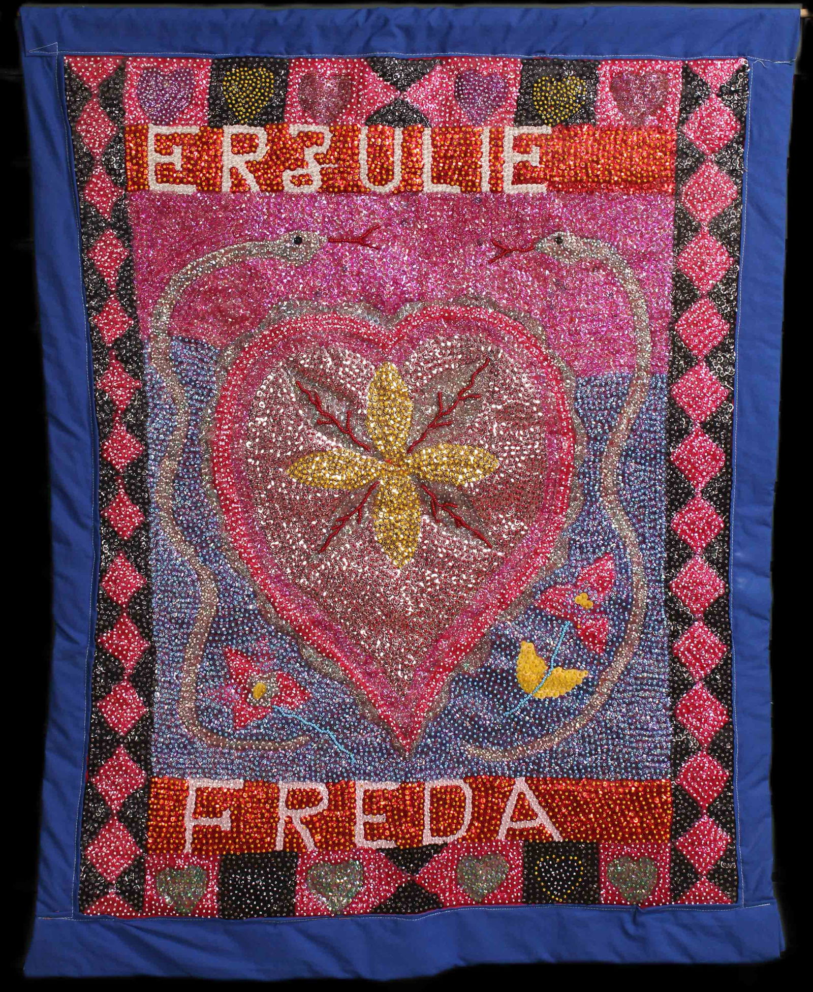 Haitian Voodoo Lwa Flag, Erzulie Freda: Erzulie Fréda Dahomey, the Rada aspect of Erzulie, is the Haitian African spirit of love, beauty, jewelry, dancing, luxury, and flowers. She wears three wedding rings, one for each husband - Damballa