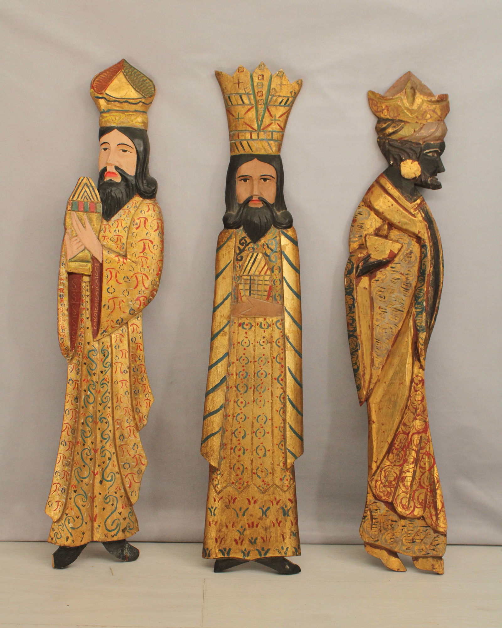 The Magi, 3 Wise Men, Carved Wood: Three wise men in relief, carved wood with gilding, Size: 30"T x 7"W x 1.25"D each
