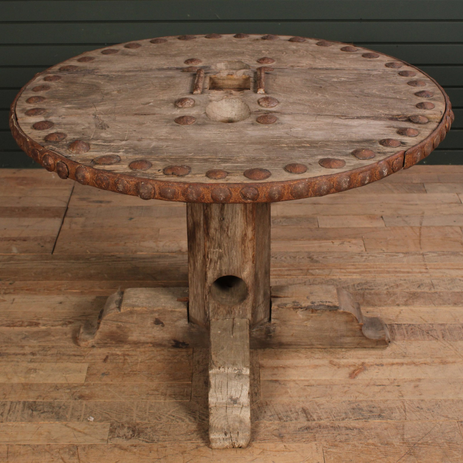 Salvaged Timber Table, Pedestal Table: Occasional table made from salvaged wood with oversized rivet details, breaks down into 3 pieces for transport. Great weathering and patina throughout. Size: 28"T x 38" diameter
