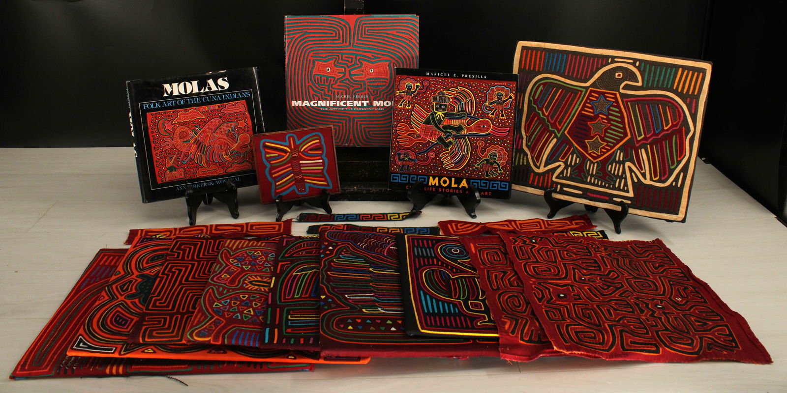 Group of Cuna Mola Samples with Reference Books (1 of 16)