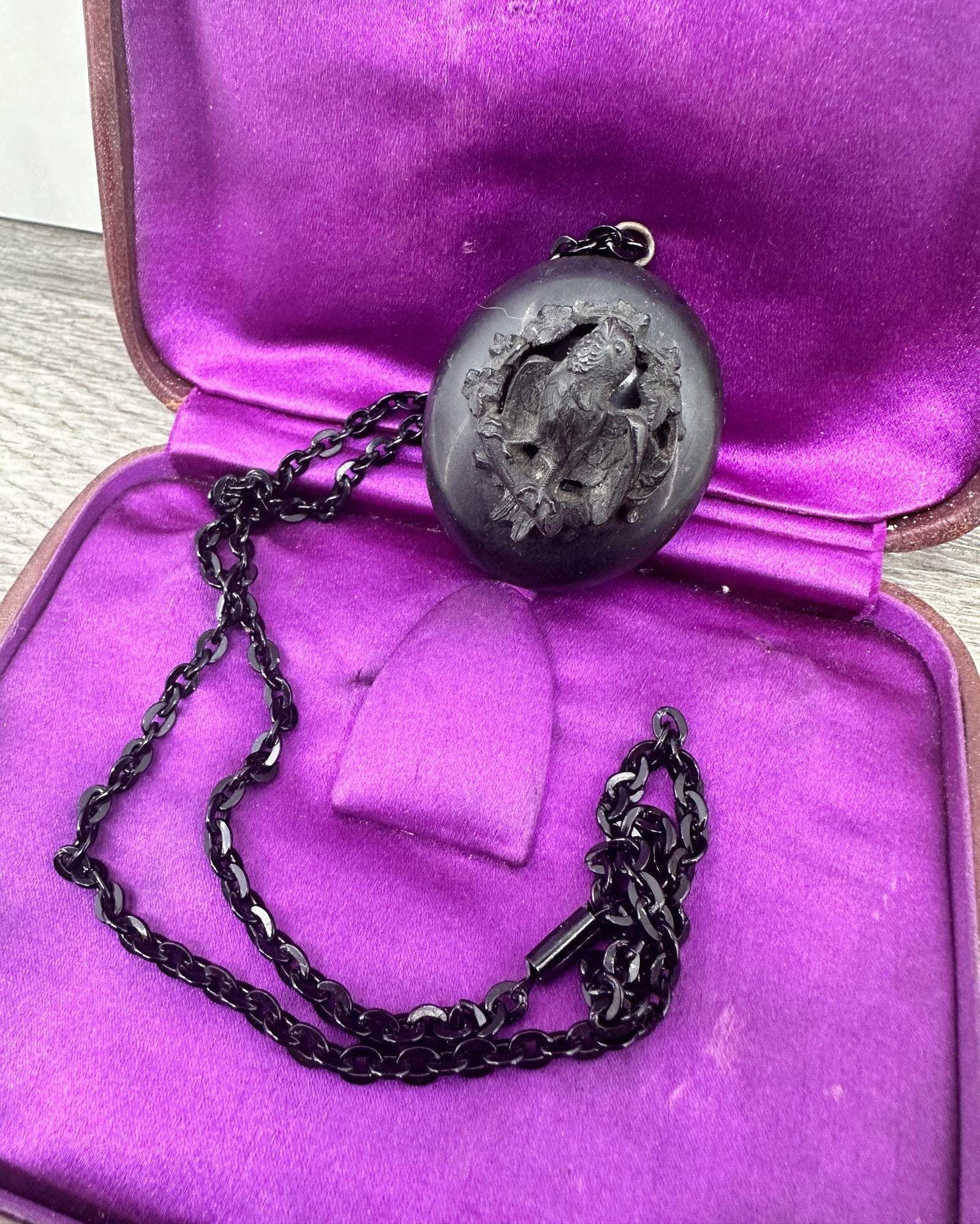 Gutta Percha Locket With Bird on Chain (1 of 12)