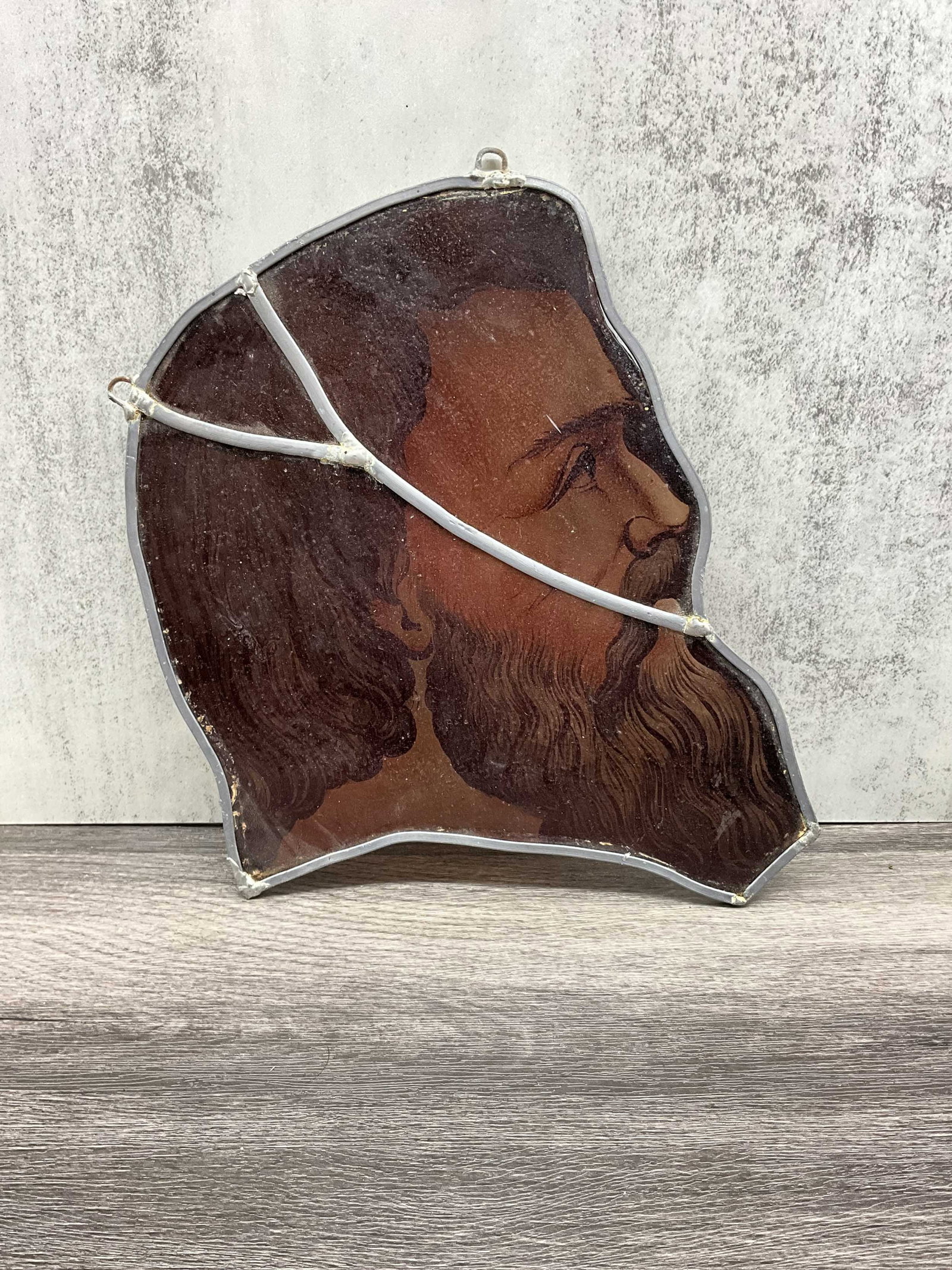 Antique Painted Glass Fragment, Portrait, Jesus: Antique stained and painted glass fragment, portrait of Jesus. Amber toned glass reverse painted on one side, beautiful facial and beard details. Great size as well. Metal surround is fully intact, th