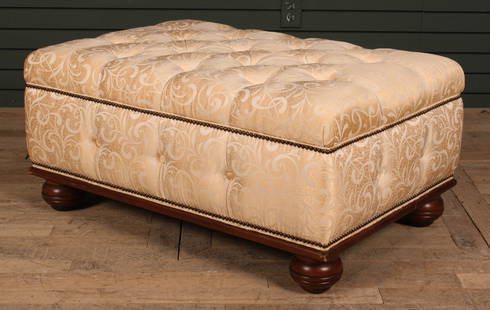 Baker Furniture Beige Upholstered Ottoman: A labeled Baker upholstered and tufted ottoman bench with turned bun feet. Size: 16"H x 36.5"W x 24.5"D