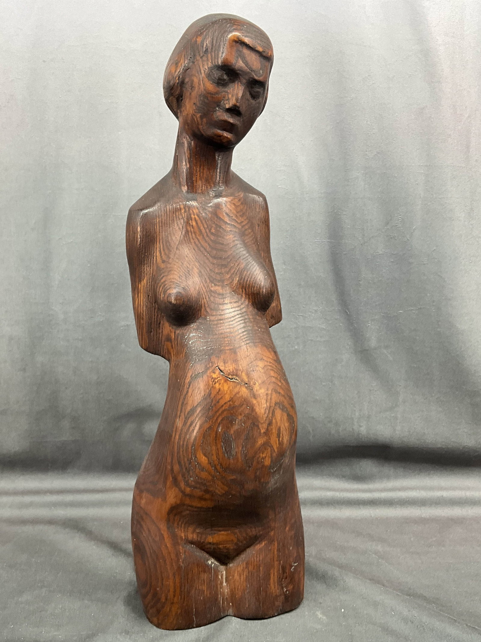 Figural Carved Wood Fertility Sculpture: Carved wood female figure, fertility sculpture. No signature. Separation to wood as shown. Size: 21"T x 6"W x 5"D