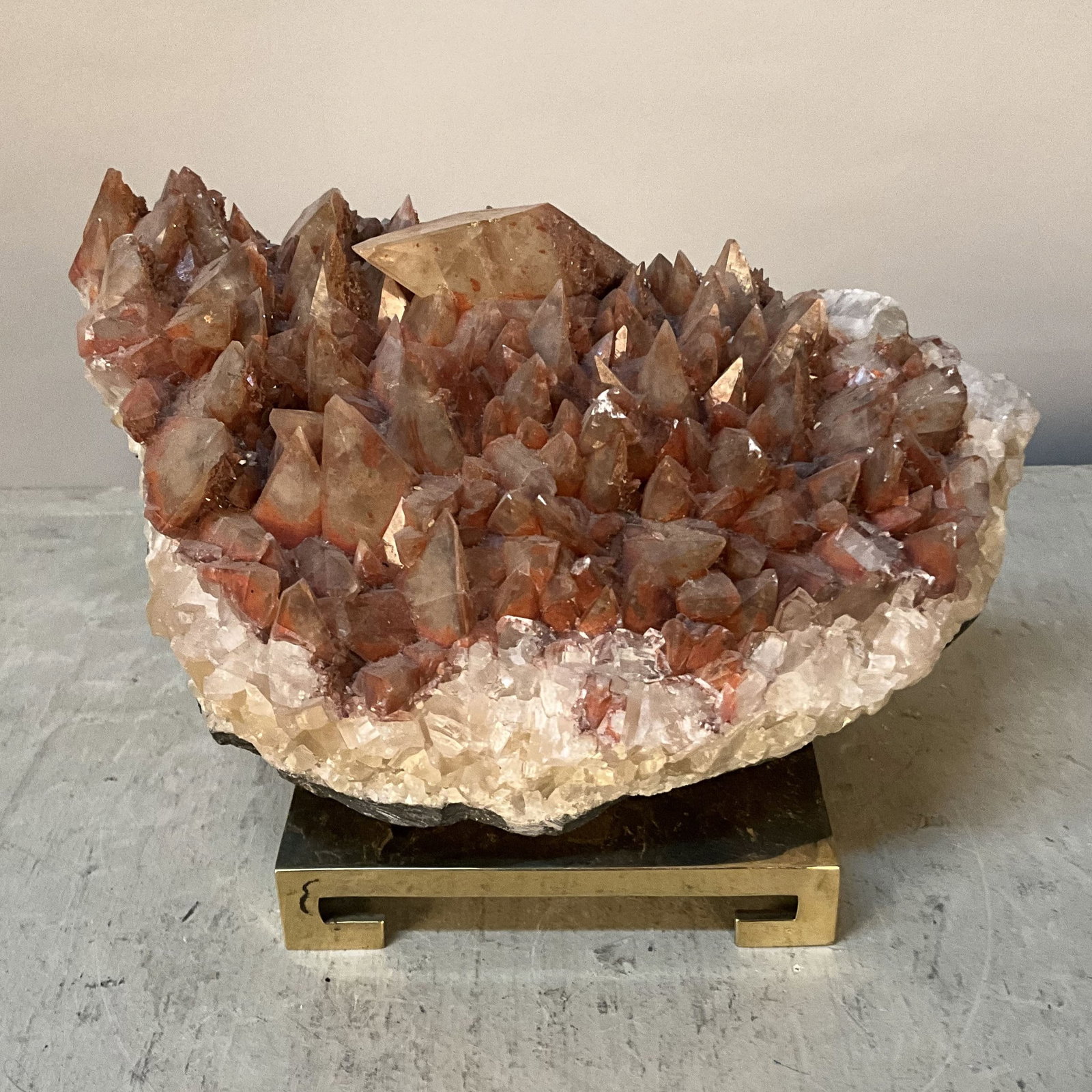 Dog Tooth Calcite On Brass Stand: Dog tooth calcite specimen with stunning deep coloration. Comes on brass stand. Size: 5"T x 9"L x 5.5"D without stand Provenance: From the lifetime collection of an Orland, Pennsylvania private estate
