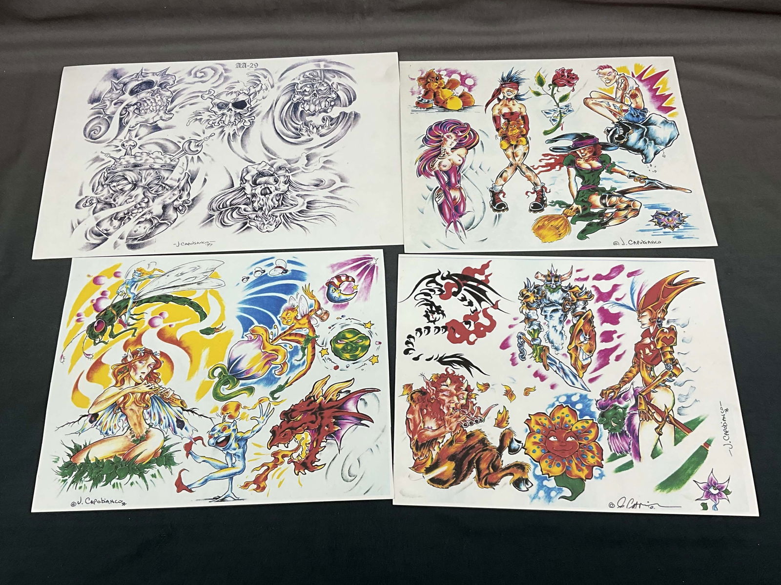 Joe Capobianco Collection, Tattoo Art Flash Sheets: Joe Capobianco Collection, Tattoo Art Flash Sheets. Vintage off the wall sheets from a local shop. From 1996-1997, 3 color and one black and grey flash sheet. Joe Capobianco was featured on Ink Master