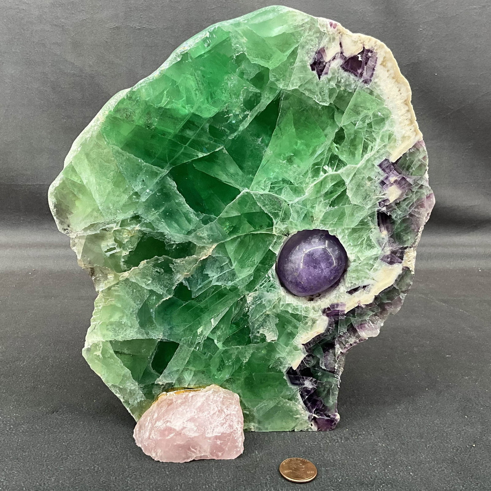 Modernist Fluorite Sculpture: Modernist fluorite sculpture with rose quartz base and removable polished eye. Size: 9"T x 8"L x 4"D Provenance: From the lifetime collection of an Oreland, Pennsylvania private estate. Shipping Optio